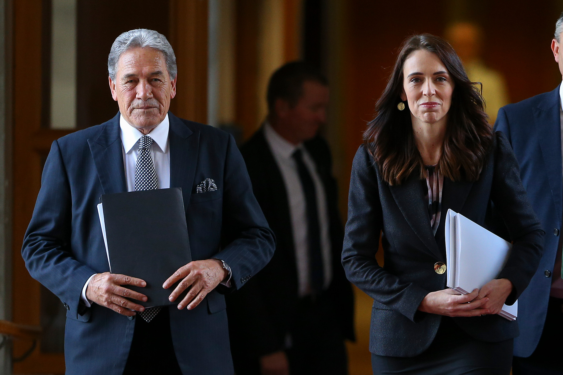 Deputy Prime Minister Winston Peters and Prime Minister Jacinda Ardern walk to deliver the 2020 Budget. Photo / Hagen Hopkins