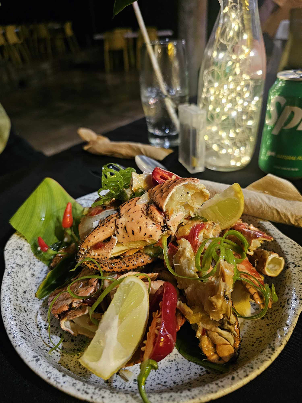 Uga, a land-dwelling coconut crab, served with chilli, lime and herbs at Vaiolama Cafe.