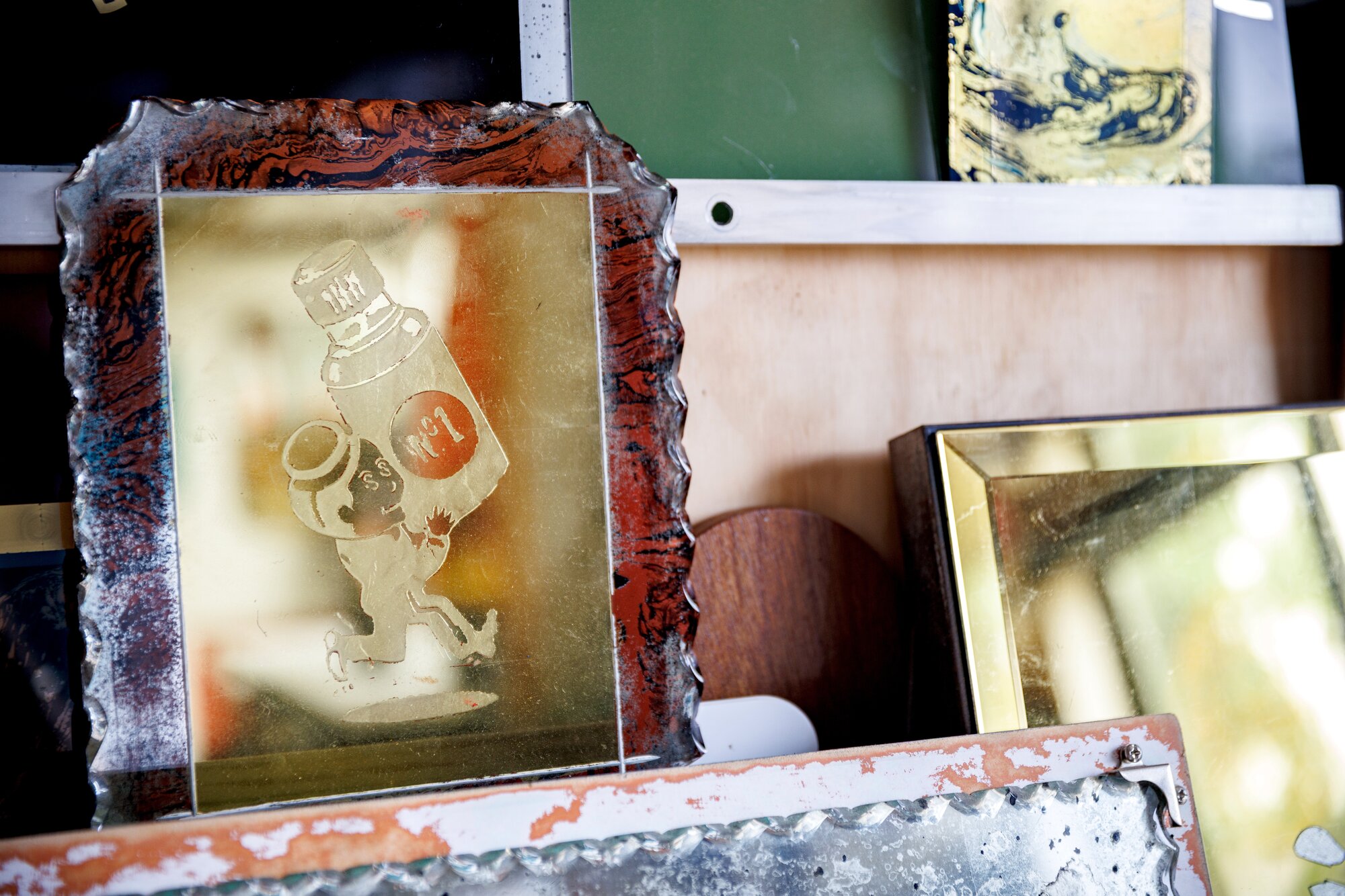 Sam's gilded mirrors, seen here at his studio, can also be spotted at eateries such as Mor Bakery in Remuera. Photo / Babiche Martens.