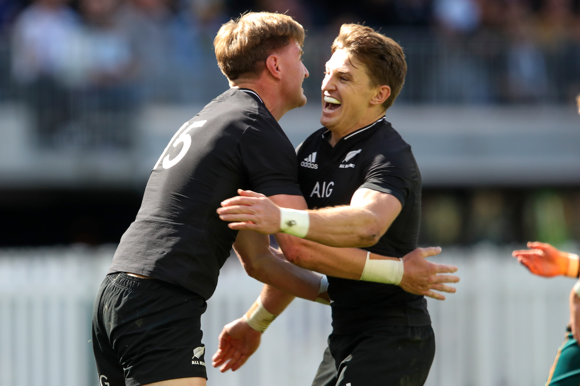 New Zealand's Jordie Barrett, left, is congratulated by teammate Beauden Barrett after scoring a try during the Rugby Championship. Photo / AP.