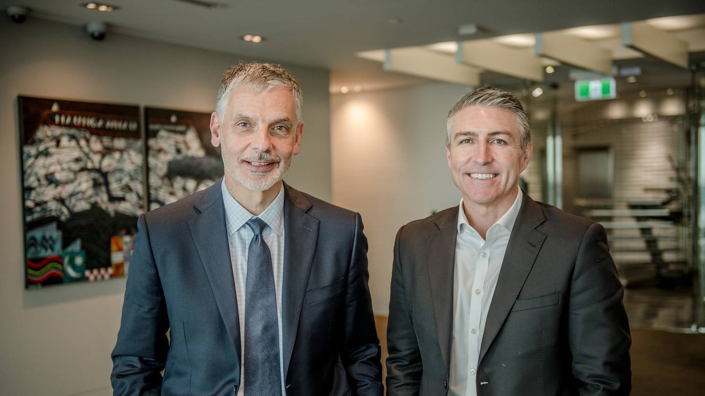 Morrison & Co and Intratil chief executive and director Marko Bogoievski with Vodafone NZ chief executive and minor shareholder Jason Paris. Photo / Supplied