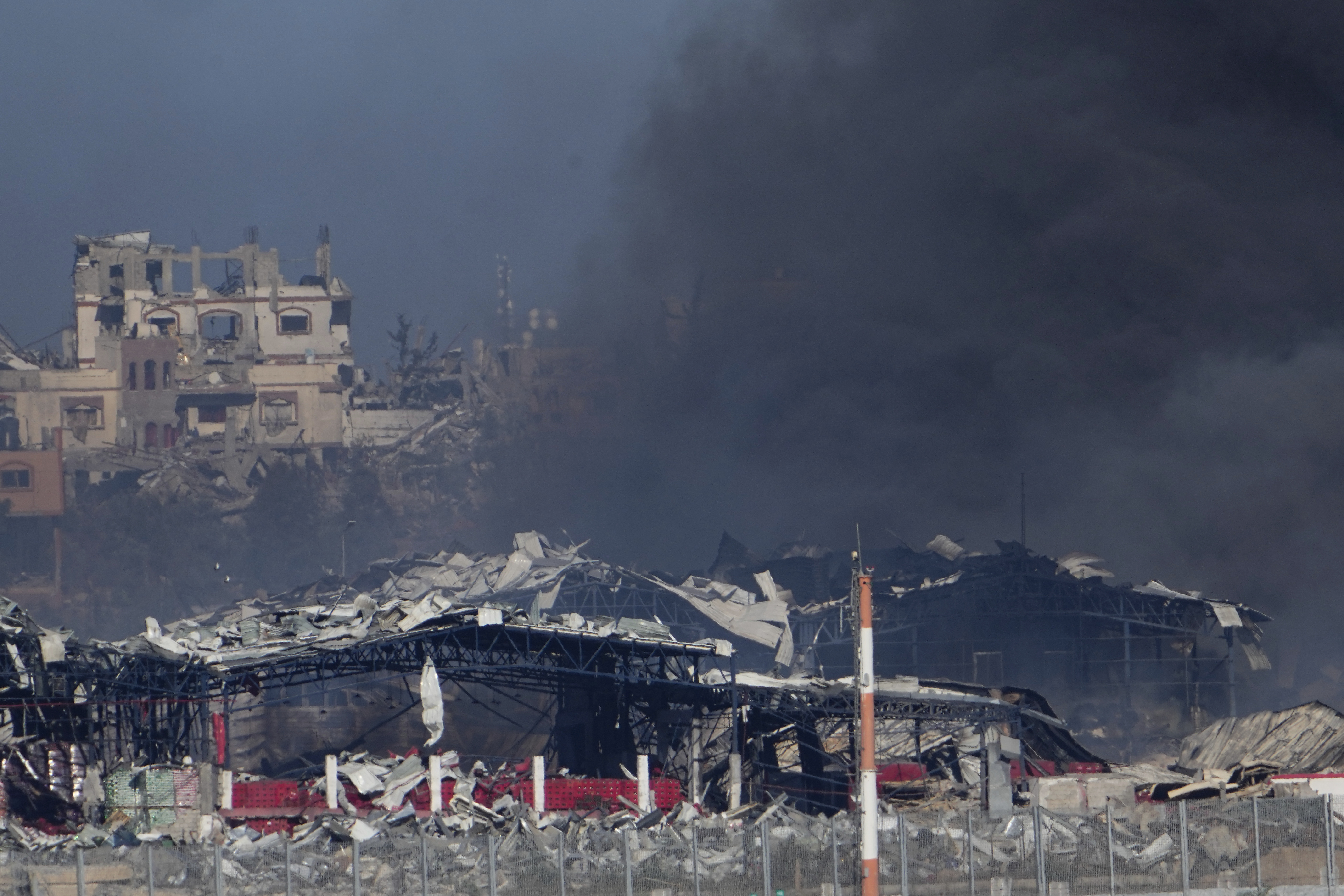 Smoke rises following an Israeli bombardment in the Gaza Strip, as seen from southern Israel, yesterday. Photo / AP