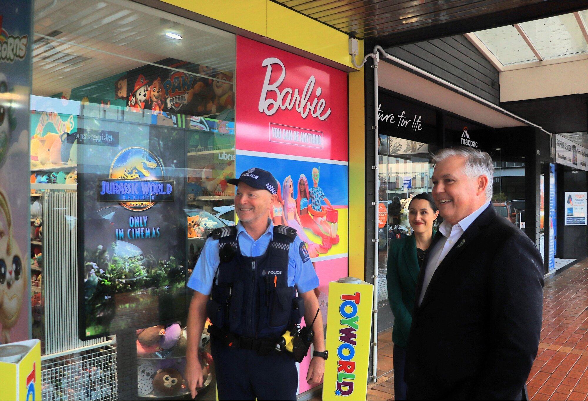 Police Minister Mark Mitchell in Rotorua's downtown area with Sergeant Colin Peers and Rotorua Mayor Tania Taspell. Photo / Annabel Reid