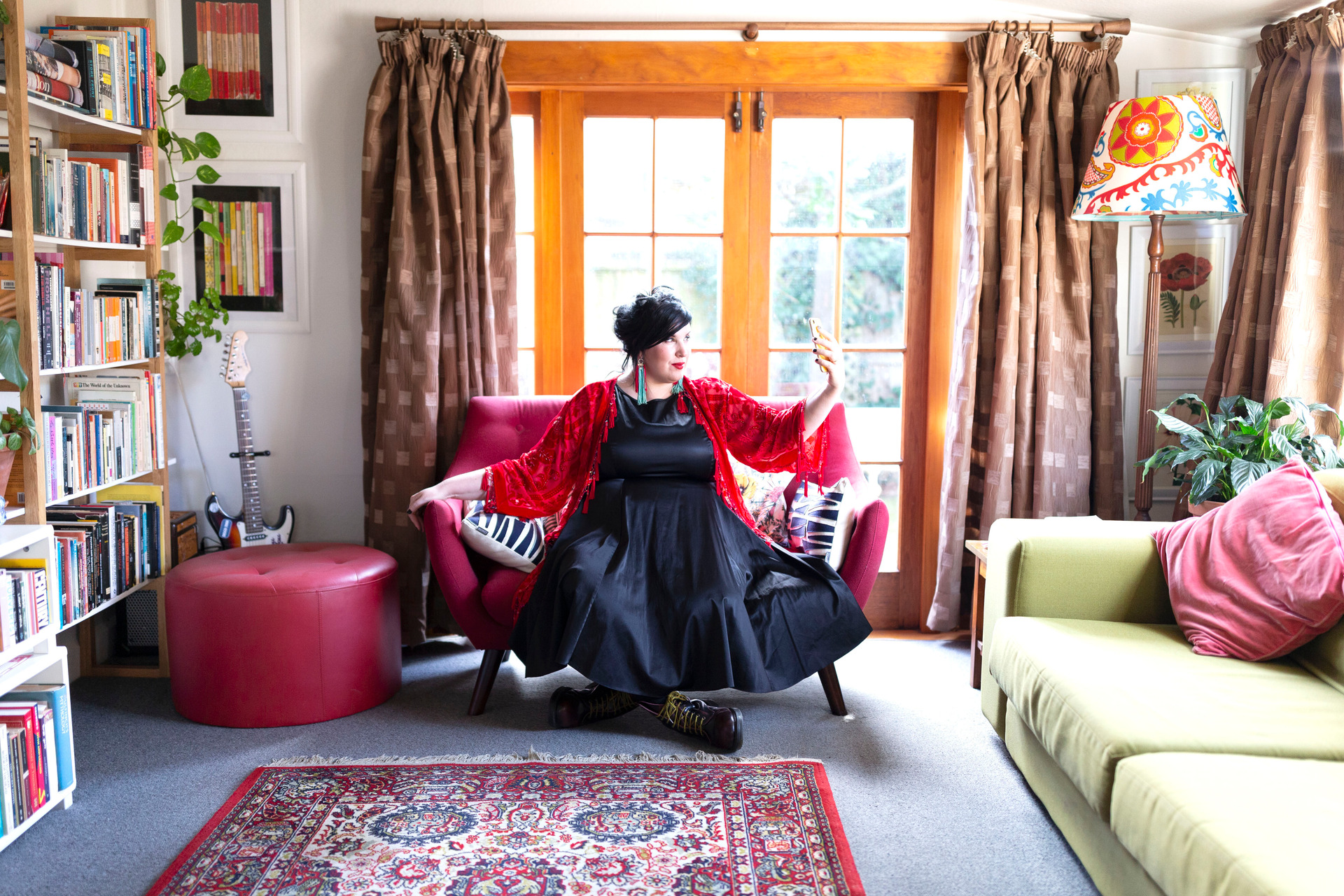 Christchurch businesswoman Louise Sutherland says you'll never catch her in a grey two-piece. She aims to inspire others via her Outfit Of The Day Instagram posts. Photo / Martin Hunter