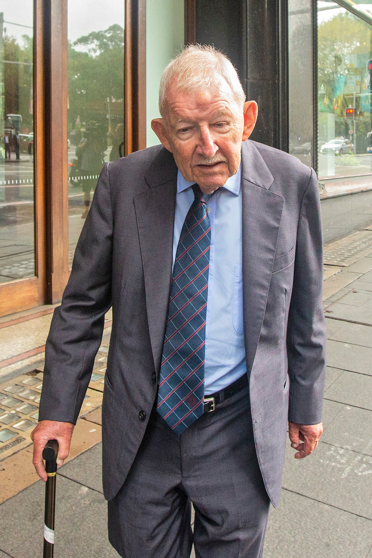 Ron Brierley, charged with possession of child abuse material, leaves the Downing Centre Local Court in Sydney in February 2020. Photo / Getty Images