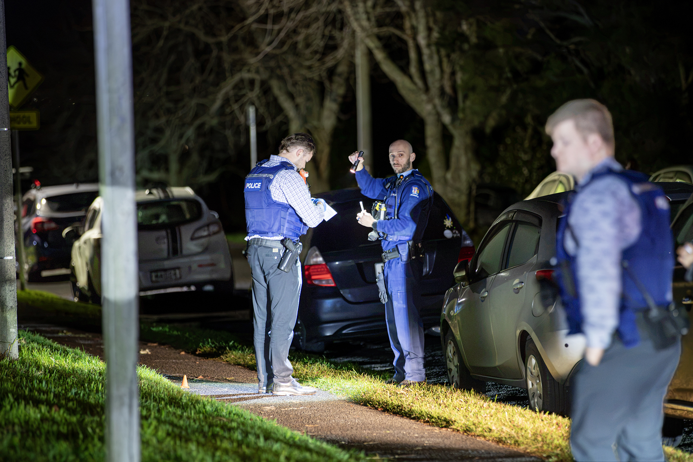Police have now left the scene on Valley View Road in Glenfield following an evening stabbing that left one person in a serious condition.   12 July 2026. New Zealand Herald photograph by Hayden Woodward.