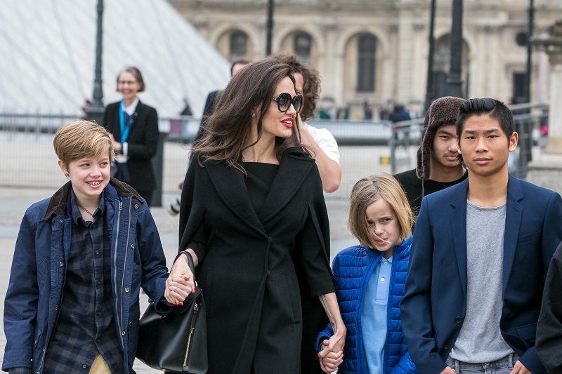[Left to right]: Angelina Jolie pictured with four kids Shiloh, Vivienne, Pax and Maddox. Photo / Getty Images