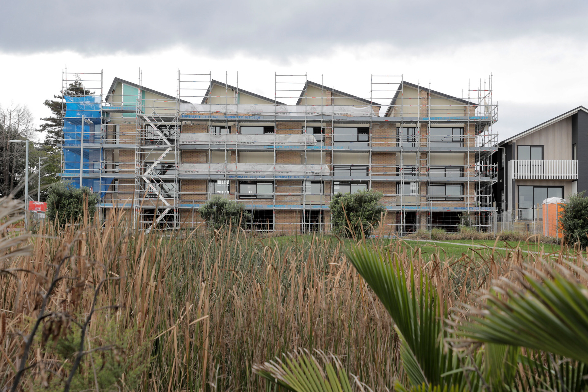 Labour and National want to see more townhouses likes these at Hobsonville Point built across Auckland. Photo / Michael Craig