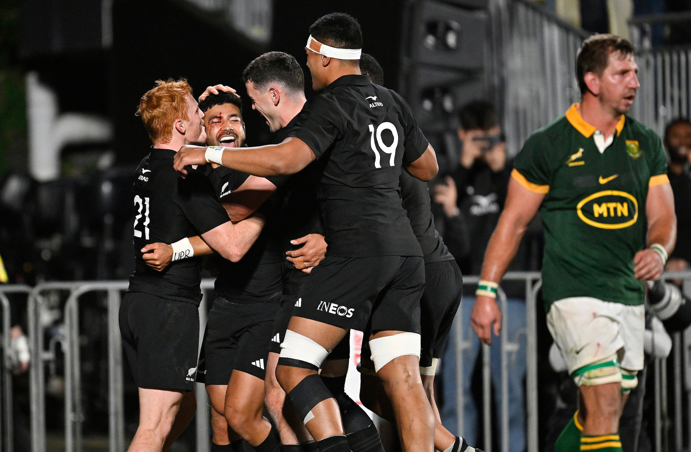 Richie Mo’unga of New Zealand celebrates his try with team mates during the All Blacks versus South Africa Springboks world championship clash at Mt Smart Stadium, Auckland. Photo /  Alan Lee / Photosport