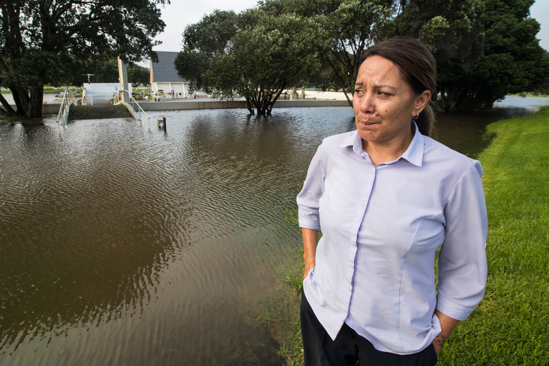 Mabel Broughton reacting to seeing the graves of her grandparents and great grandparents under water in the urupā opposite Okahu Bay after it flooded in 2017. Photo / File