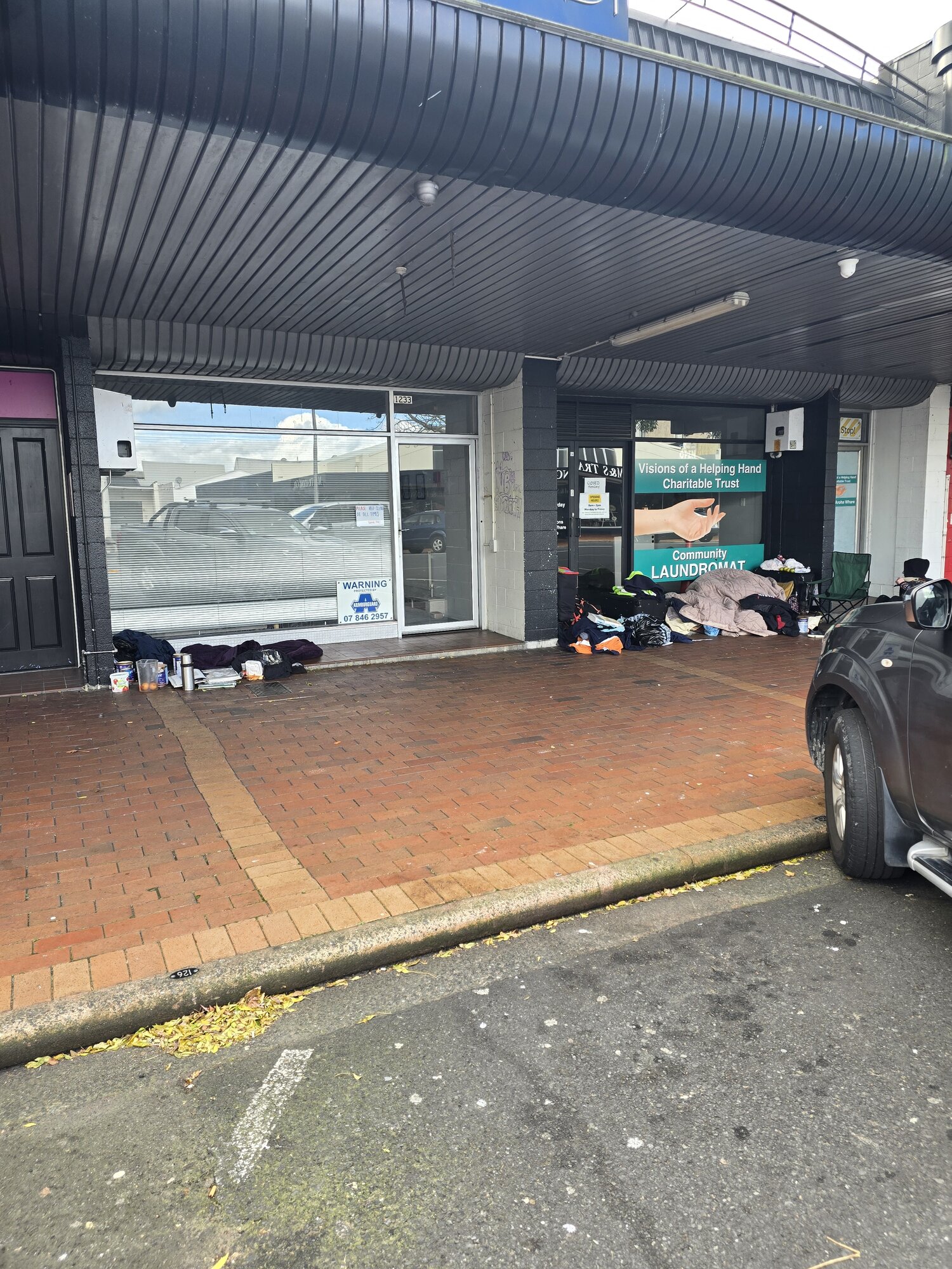 The suitcases stacked up outside Pukuatua St businesses. Photo / Supplied