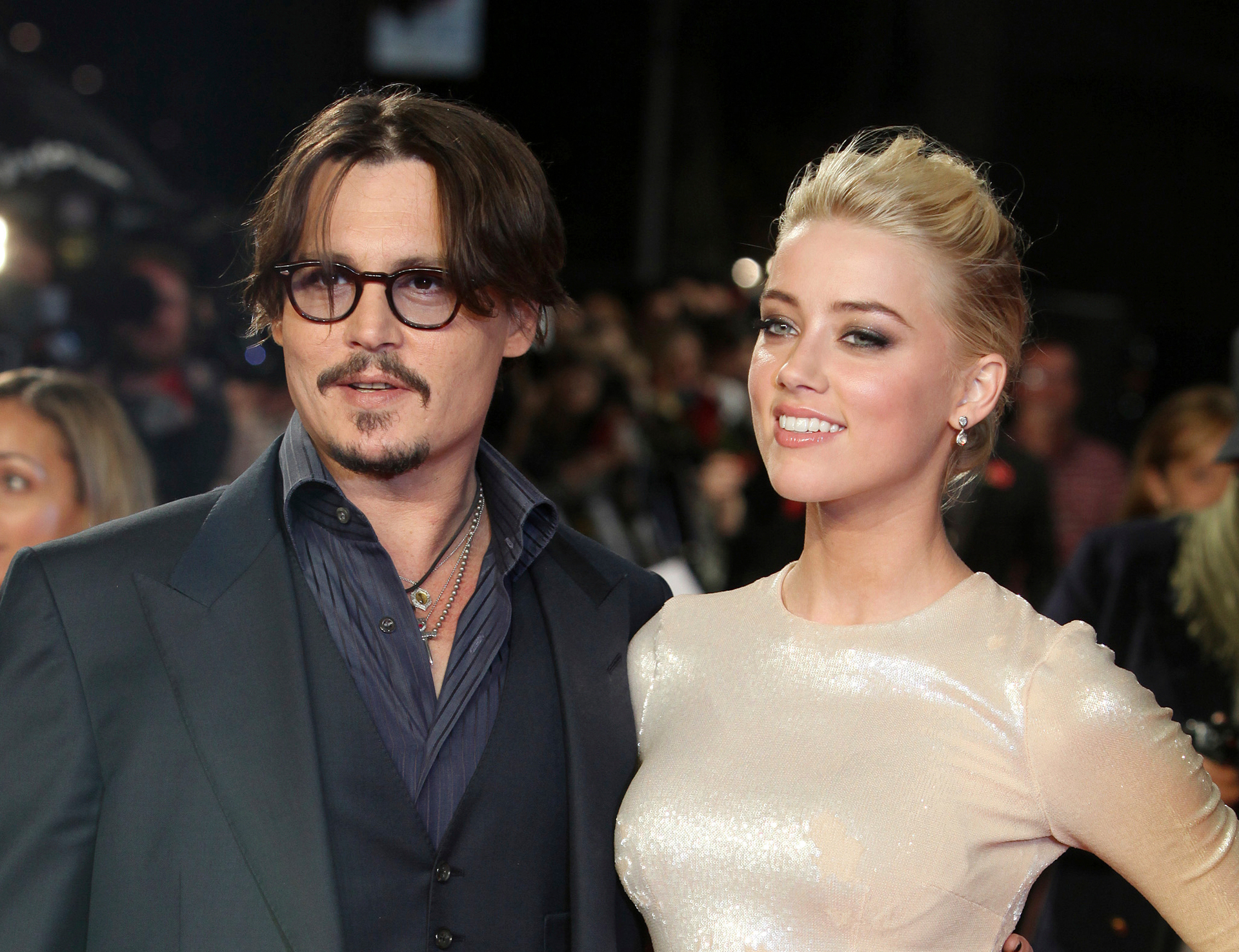 Amber Heard says she doesn't blame the jury for siding with her ex-husband Johnny Depp. Photo / AP
