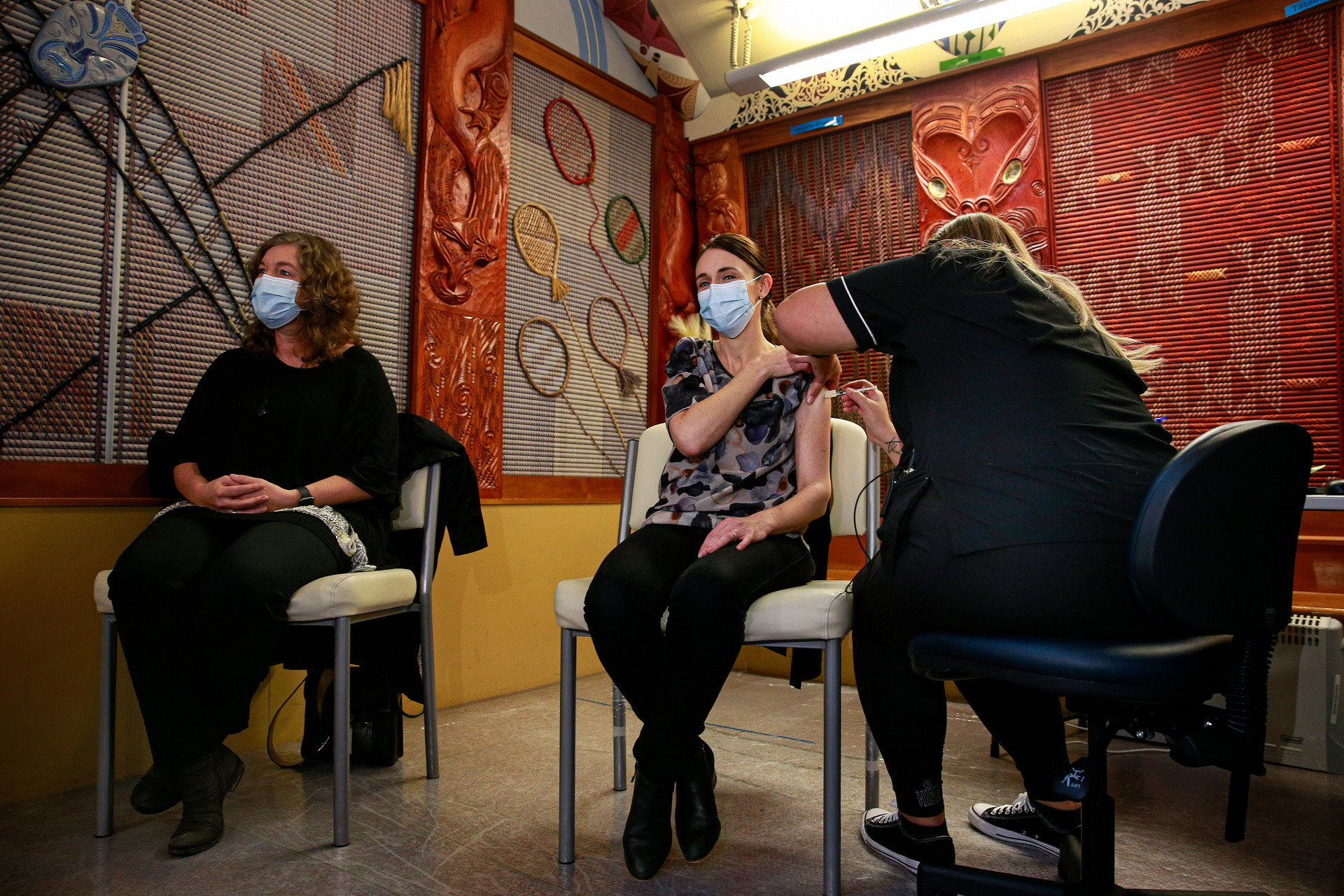Then Prime Minister Jacinda Ardern and her chief science adviser Juliet Gerrard receive their first Covid-19 vaccinations from nurse Nicole Andrews at Auckland's Manurewa Vaccination centre in June 2021. Photo / Alex Burton