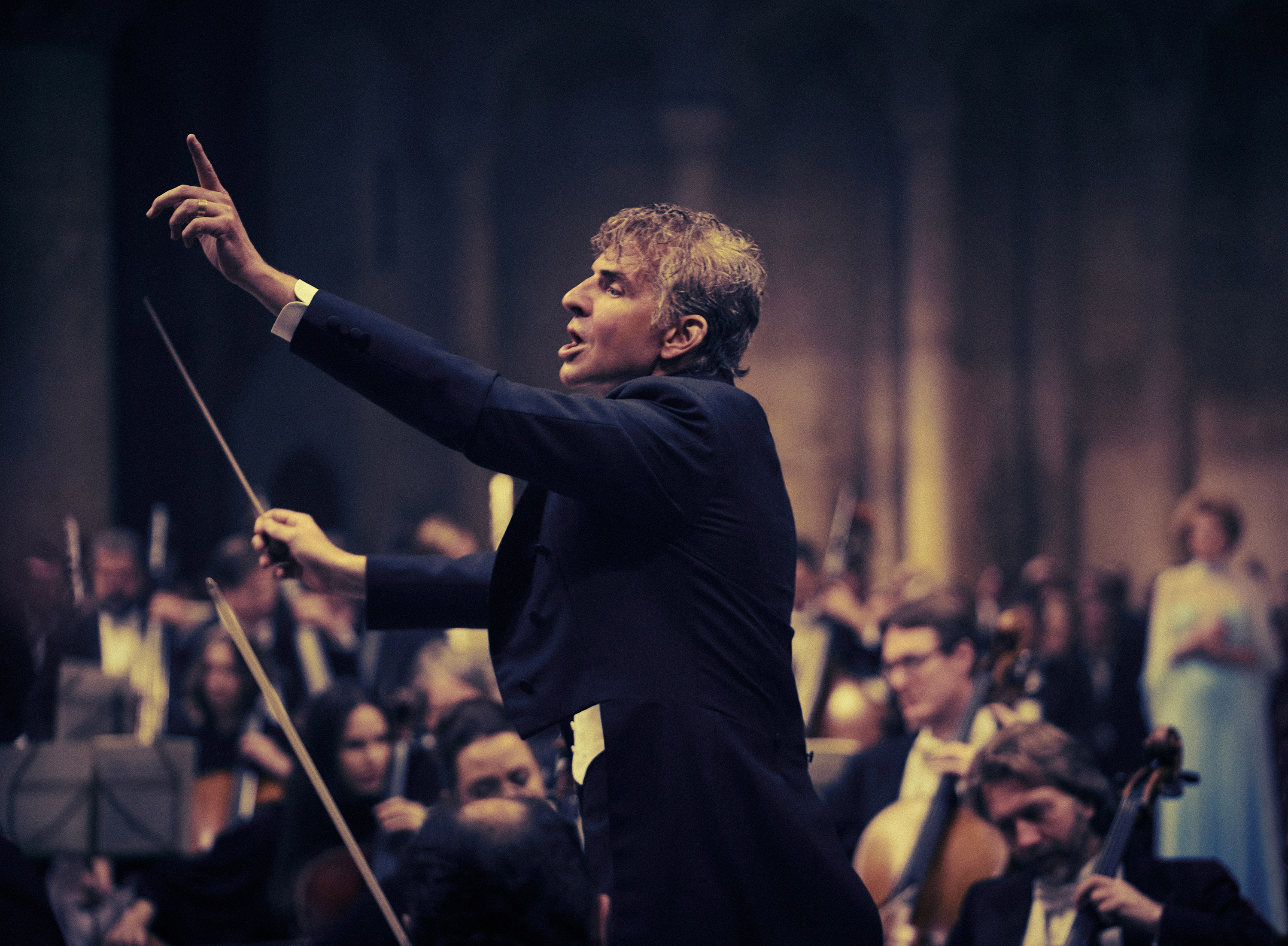 Bradley Cooper as Leonard Bernstein in Maestro. To prepare for the role he became a regular at the New York Philharmonic, attending concerts and rehearsals, sitting in the conductor’s box in the second tier and peppering musicians with questions. Photo / Jason McDonald, Netflix