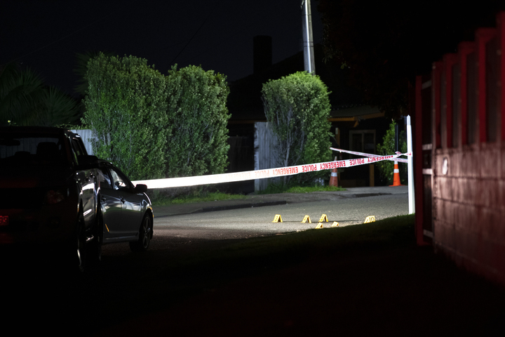 A police cordon outside a property in Te Atatu South, West Auckland, after a firearms incident last night. Photo / Hayden Woodward