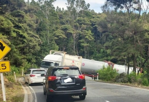 A truck and trailer blocking Cove Rd, where heavy vehicles are now banned.