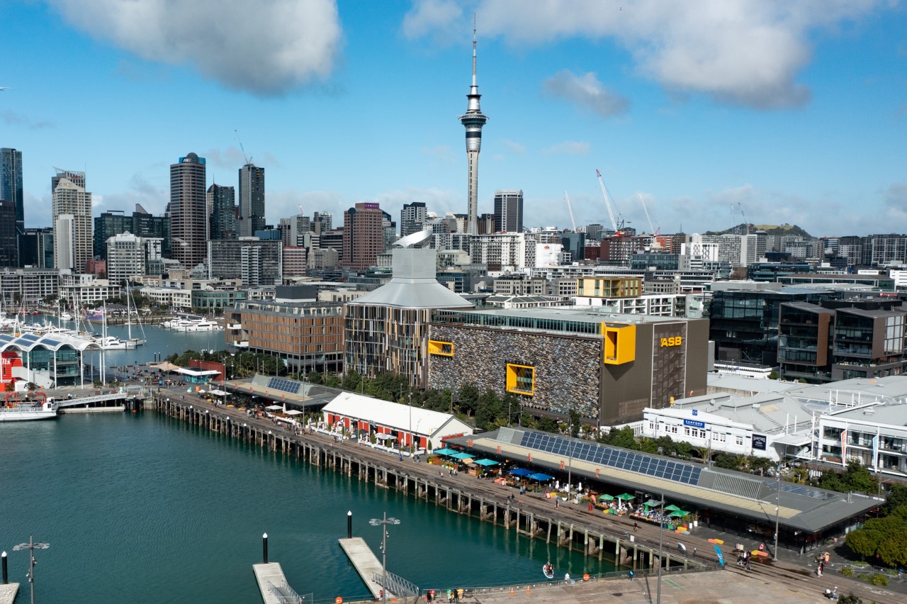 The North Wharf leasehold land for sale has these three long low buildings between the sea and ASB's headquarters. Photo / Moonshots