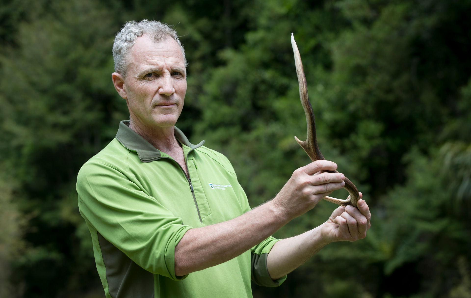 Department of Conservation East Coast operations manager John Lucas with a discarded antler from one of the