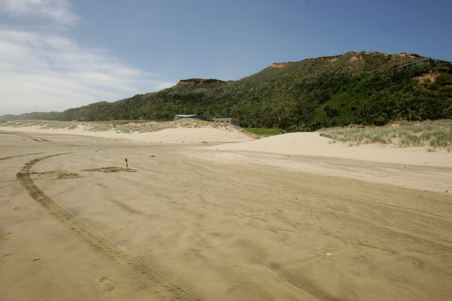 DoC and local iwi Te Uri O Hau and Te Roroa want people to take care if driving on Ripiro Beach, above, this Summer season.
