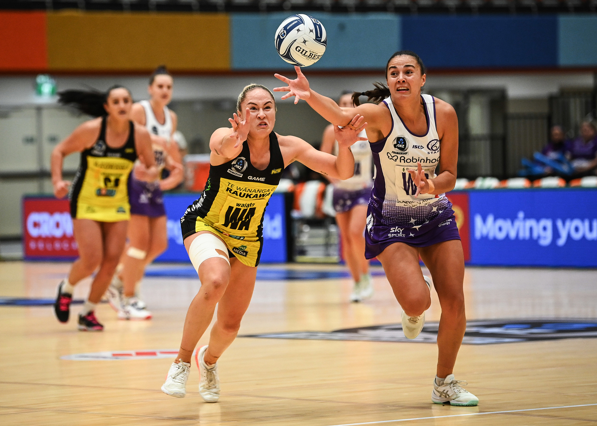 Whitney Souness and Holly Fowler chase the ball in the ANZ Premiership. Photo / Photosport
