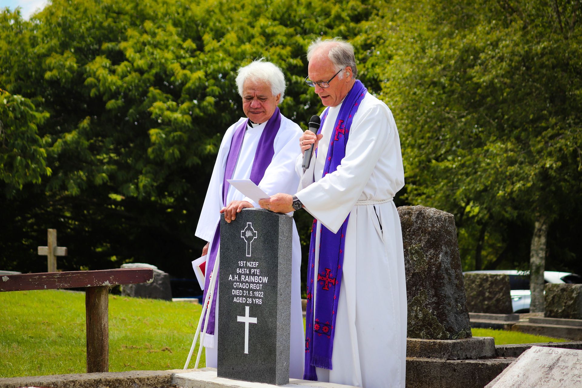 Reverend Murray Olson takes the rededication service for Private Albert Rainbow at Piopio Cemetery. Photo / Emma James Photography