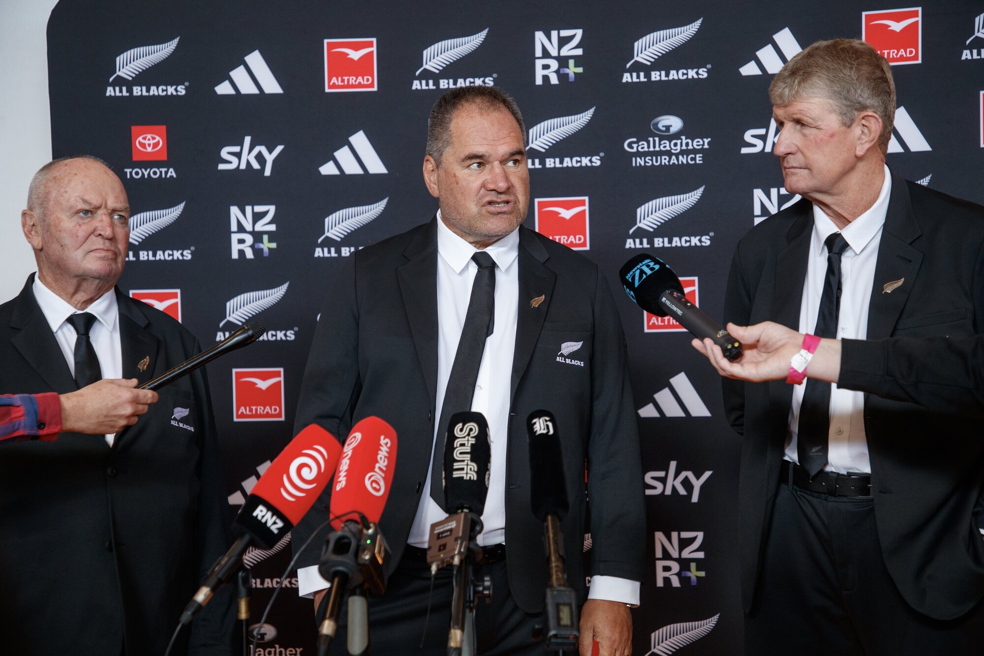 All Blacks head coach Dave Rennie (centre), flanked by selector Sir Graham Henry (left) and assistant coach Neil Barnes before the team naming in Feliding. Photo / Mark Mitchell