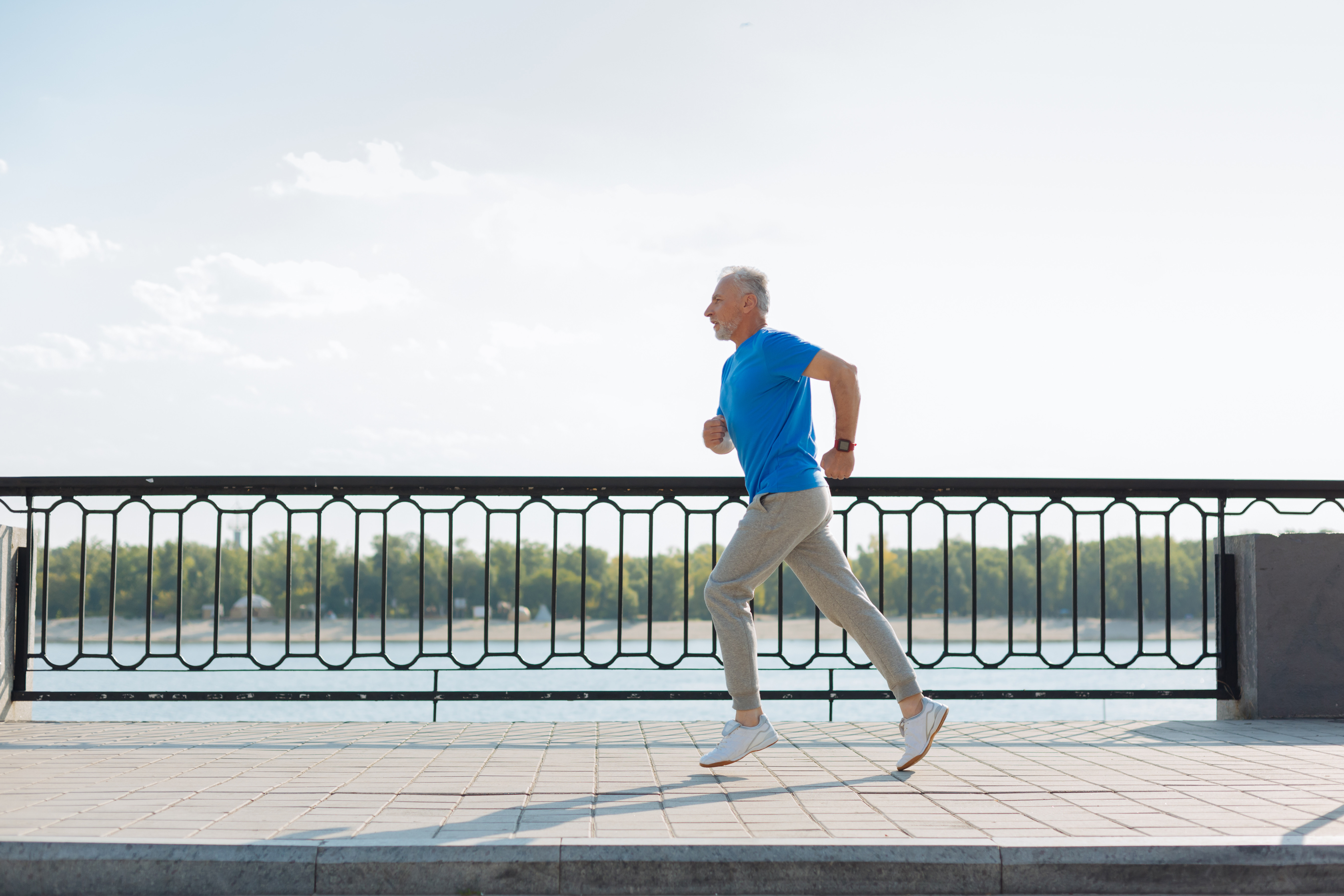 Low-intensity exercises like casual tennis, long walks, or light jogging are more beneficial for stressed individuals than high-intensity workouts, helping to reduce cortisol levels. Photo / 123rf