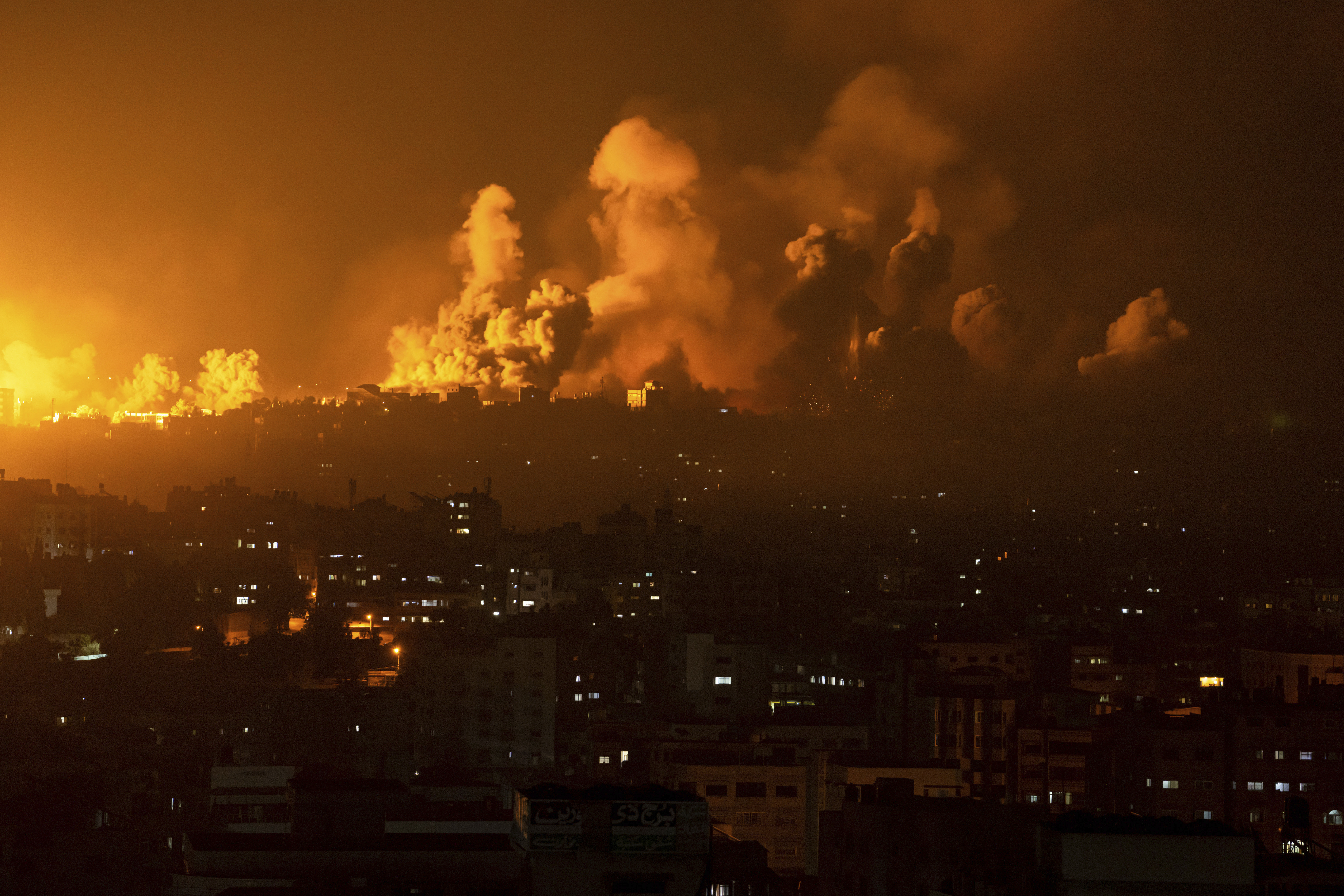 Fire and smoke rise following an Israeli airstrike in Gaza City. Photo / AP