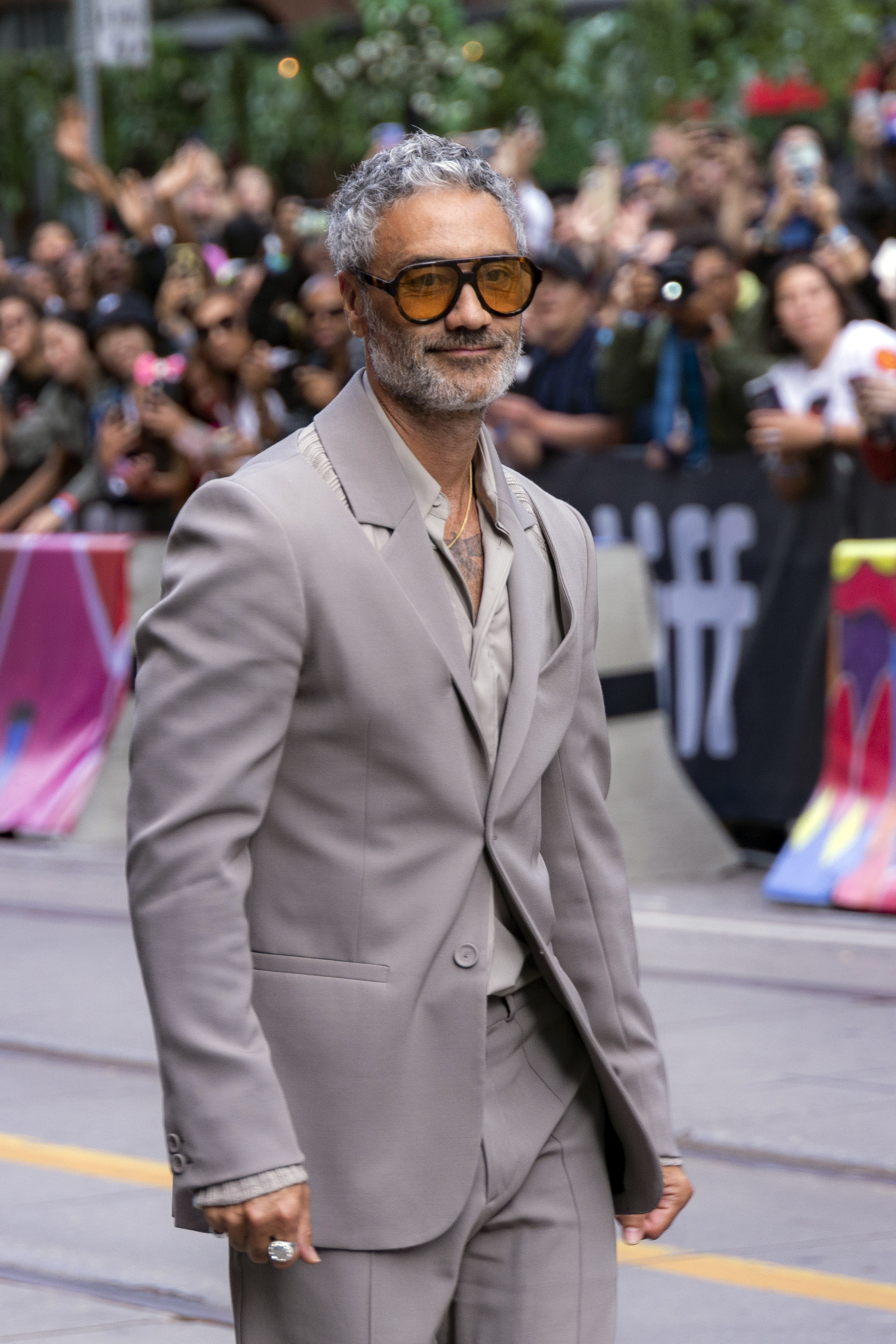 Taika Waititi has been showing Aotearoa and its weather at its best this week to his wife. Photo / AP