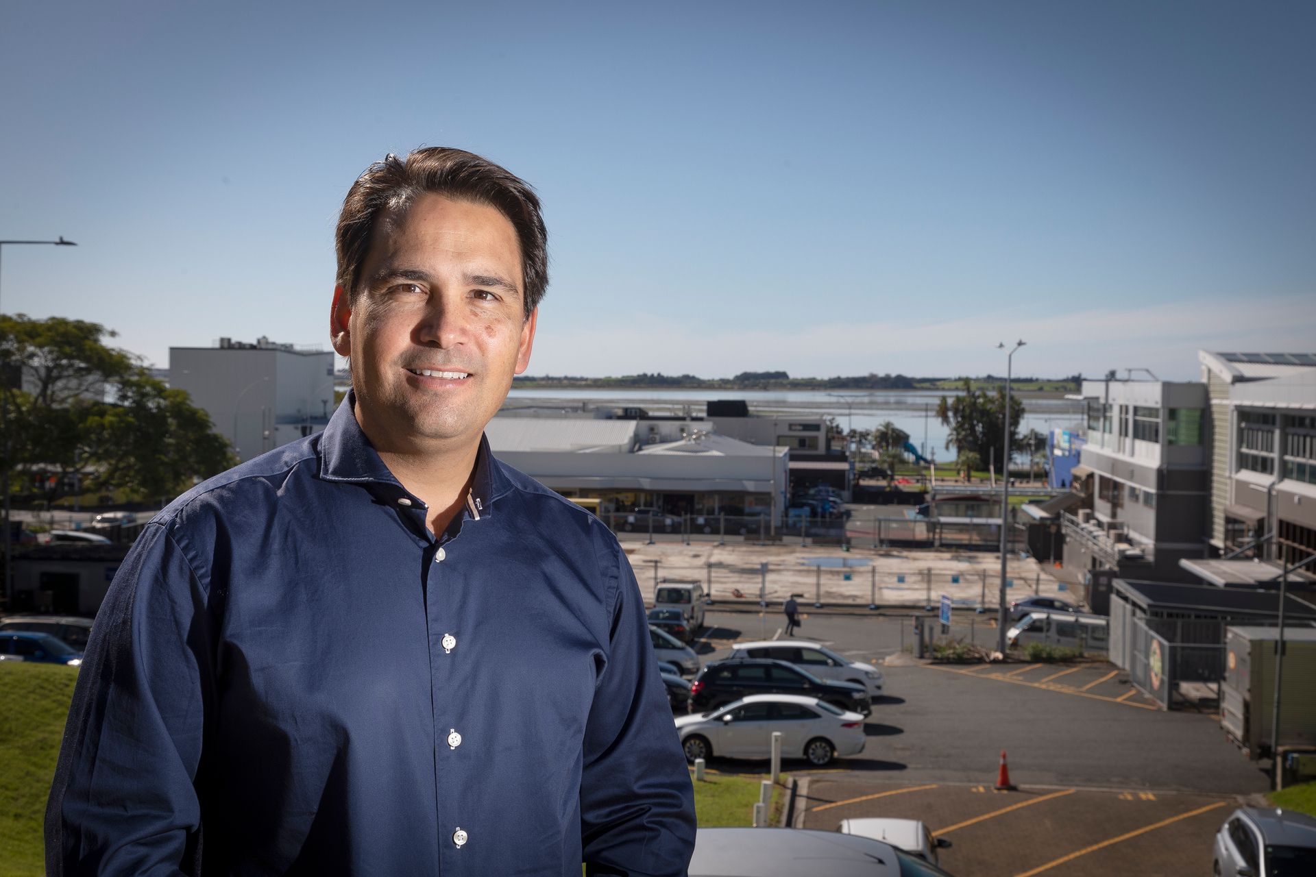 Tauranga MP Simon Bridges looks forward to a museum being built on the land pictured behind him. Photo / Andrew Warner