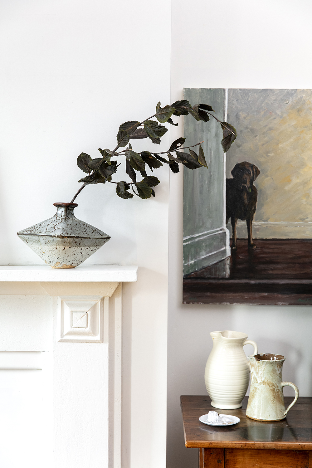 A painting and special ceramics from Ali McIntosh's home, featured in Viva in 2022. Photo / Babiche Martens