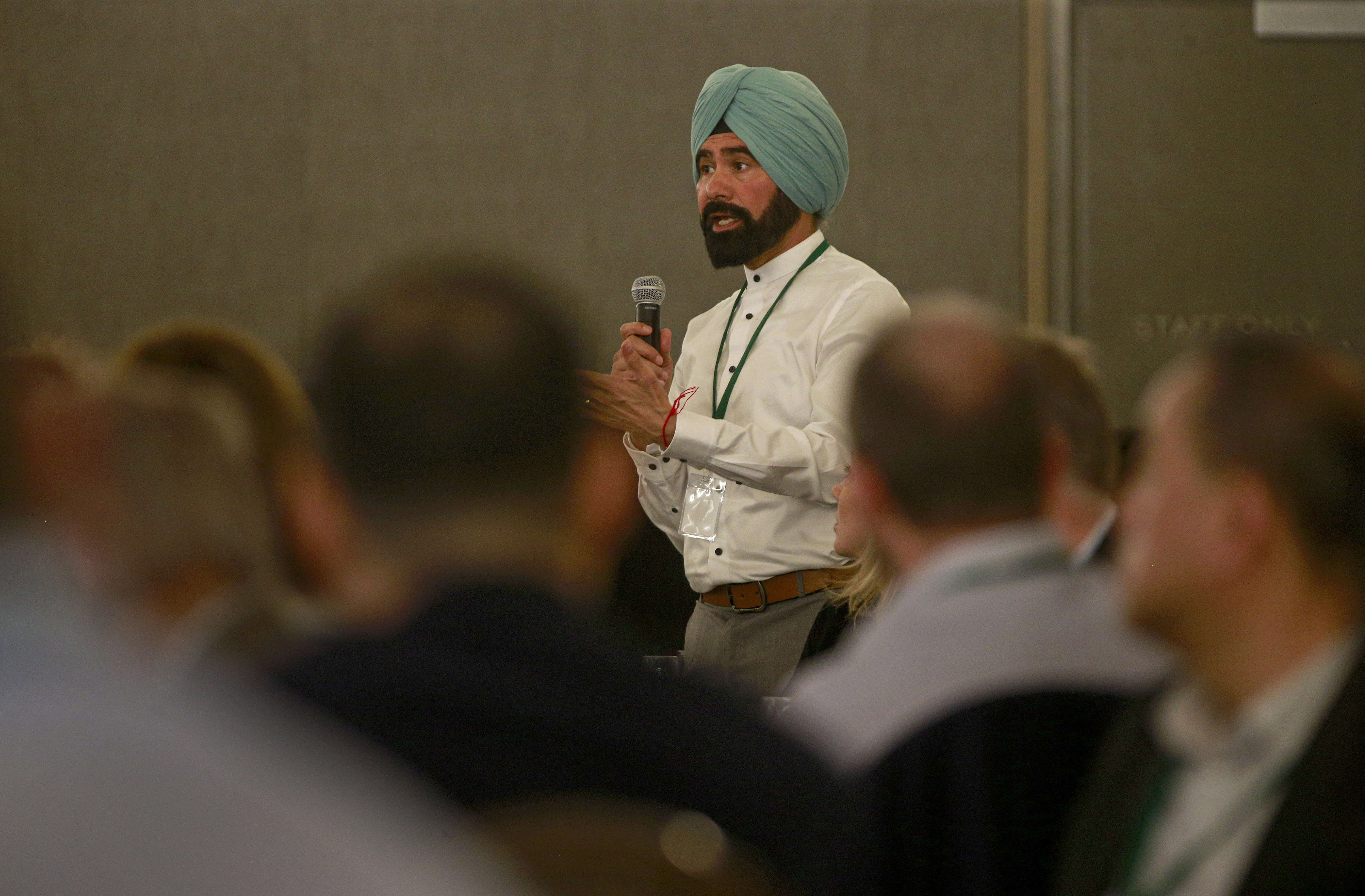 A delegate asking a question at the NZAMI conference at the Cordis. Photo / Alex Burton