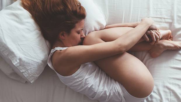 Period pain is a common complaint of the female menstrual cycle. Photo / Getty Images