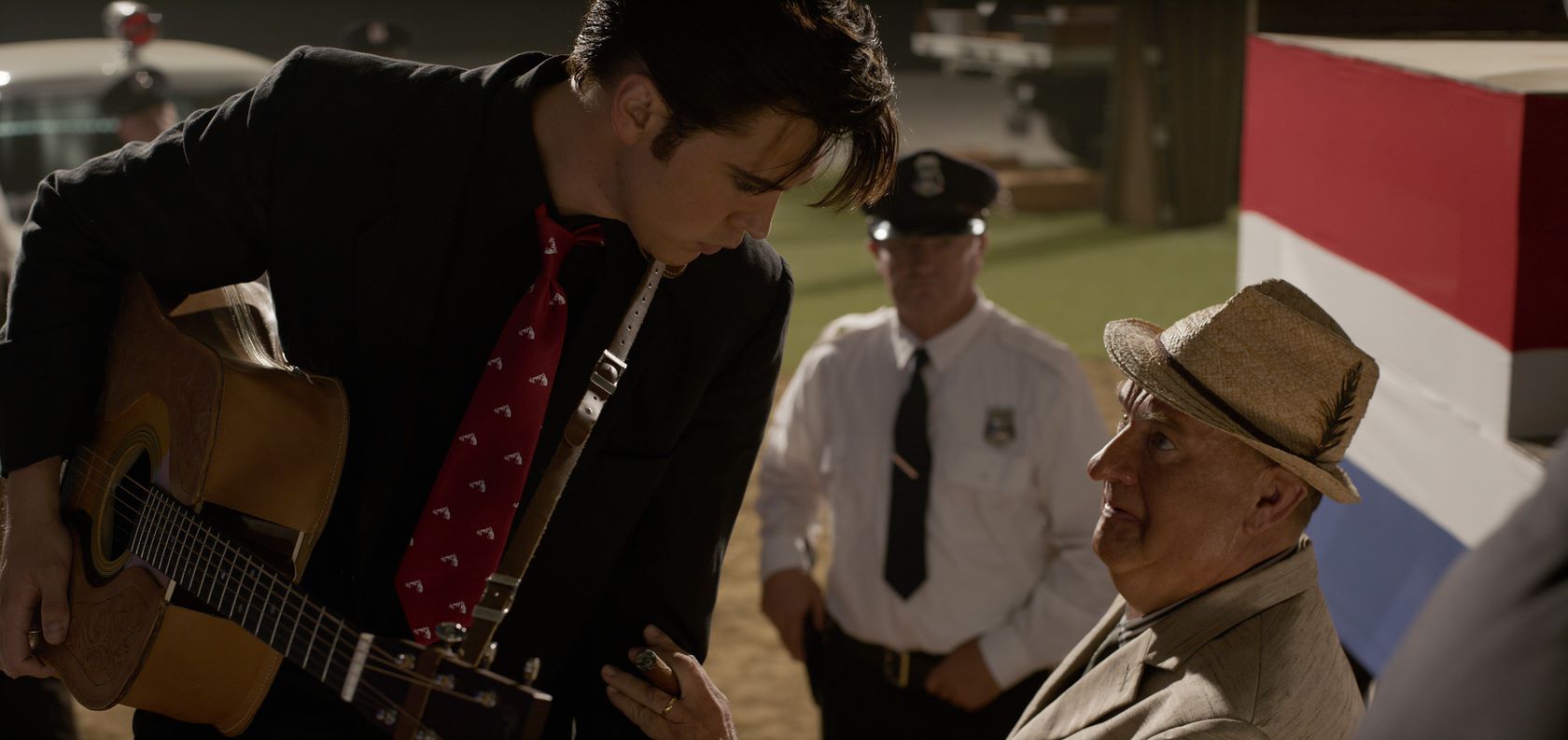 Butler's Elvis speaks to his insidious manager Tom Parker played by Tom Hanks. Photo / Supplied