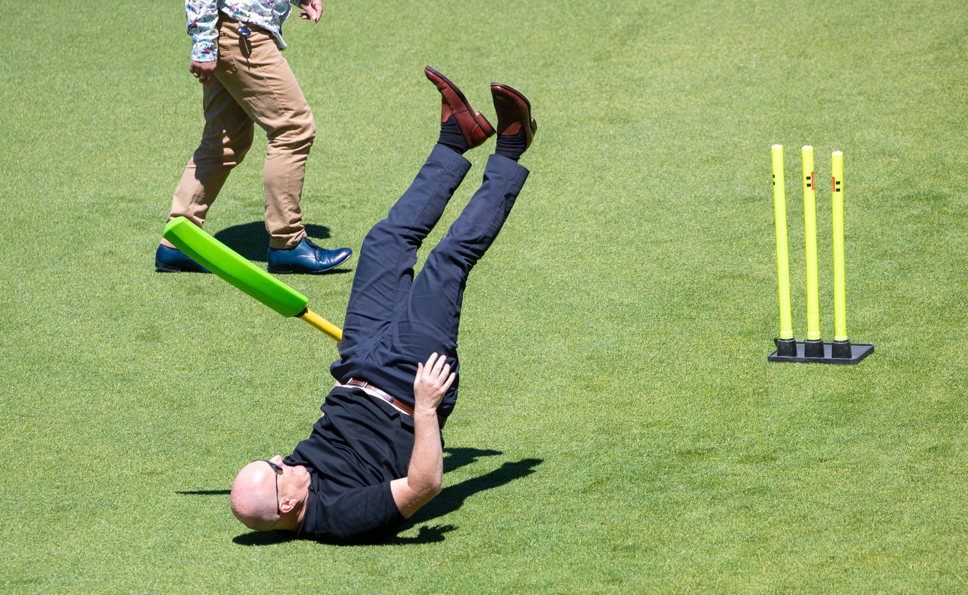 National MP for Botany Christopher Luxon takes a tumble while playing cricket. Photo / Mark Mitchell