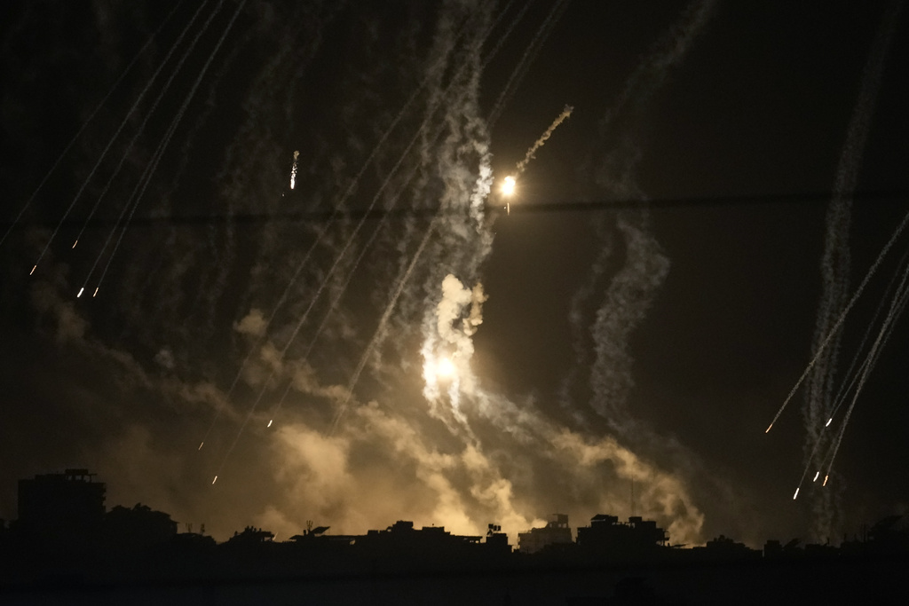 Smoke and flares rise over Gaza City during an Israeli strike in the Gaza Strip, as seen from southern Israel on November 10. Photo / AP