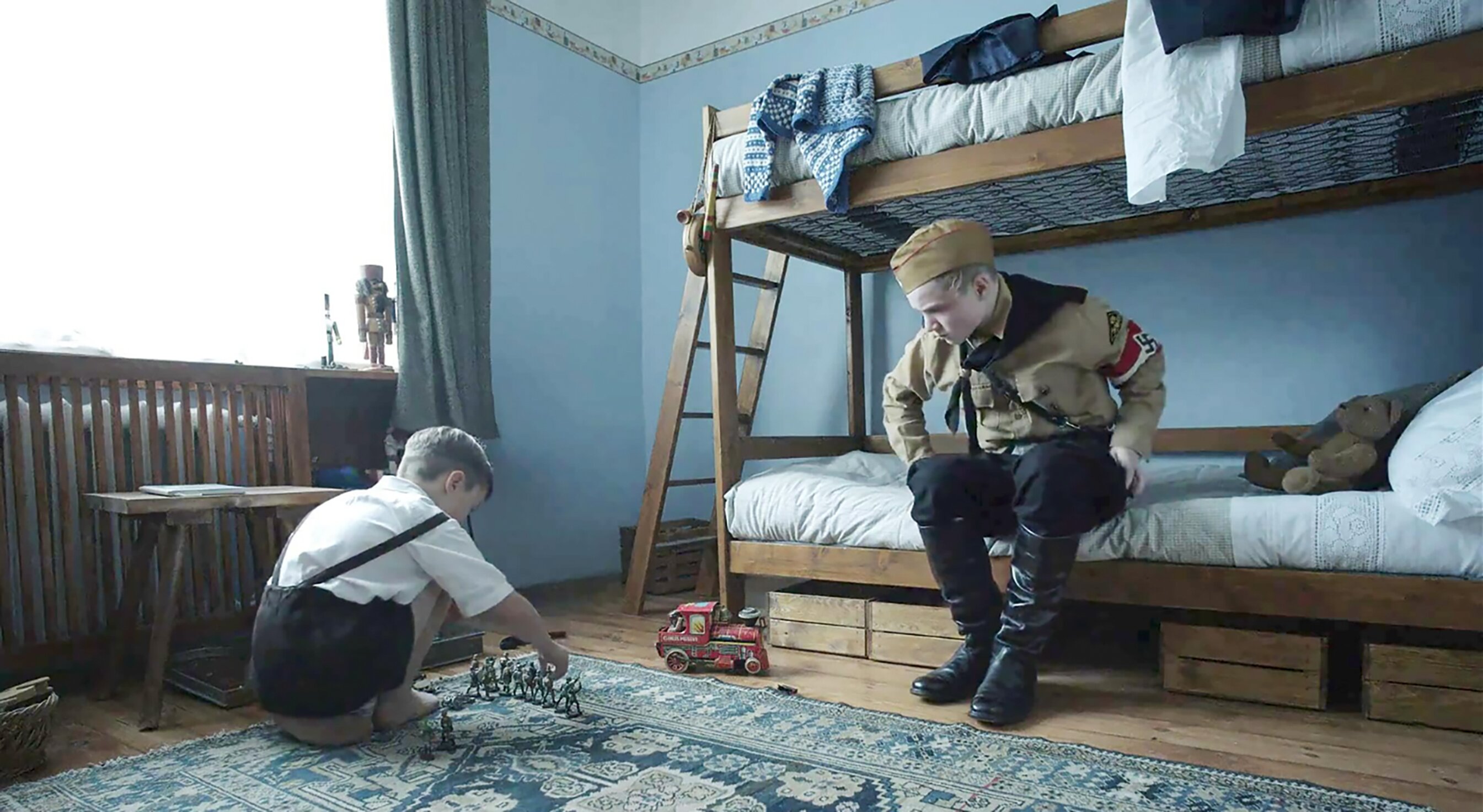 Johann Karthaus and Luis Noah Witte in The Zone of Interest, Jonathan Glazer's film based on the 2014 novel by Martin Amis.