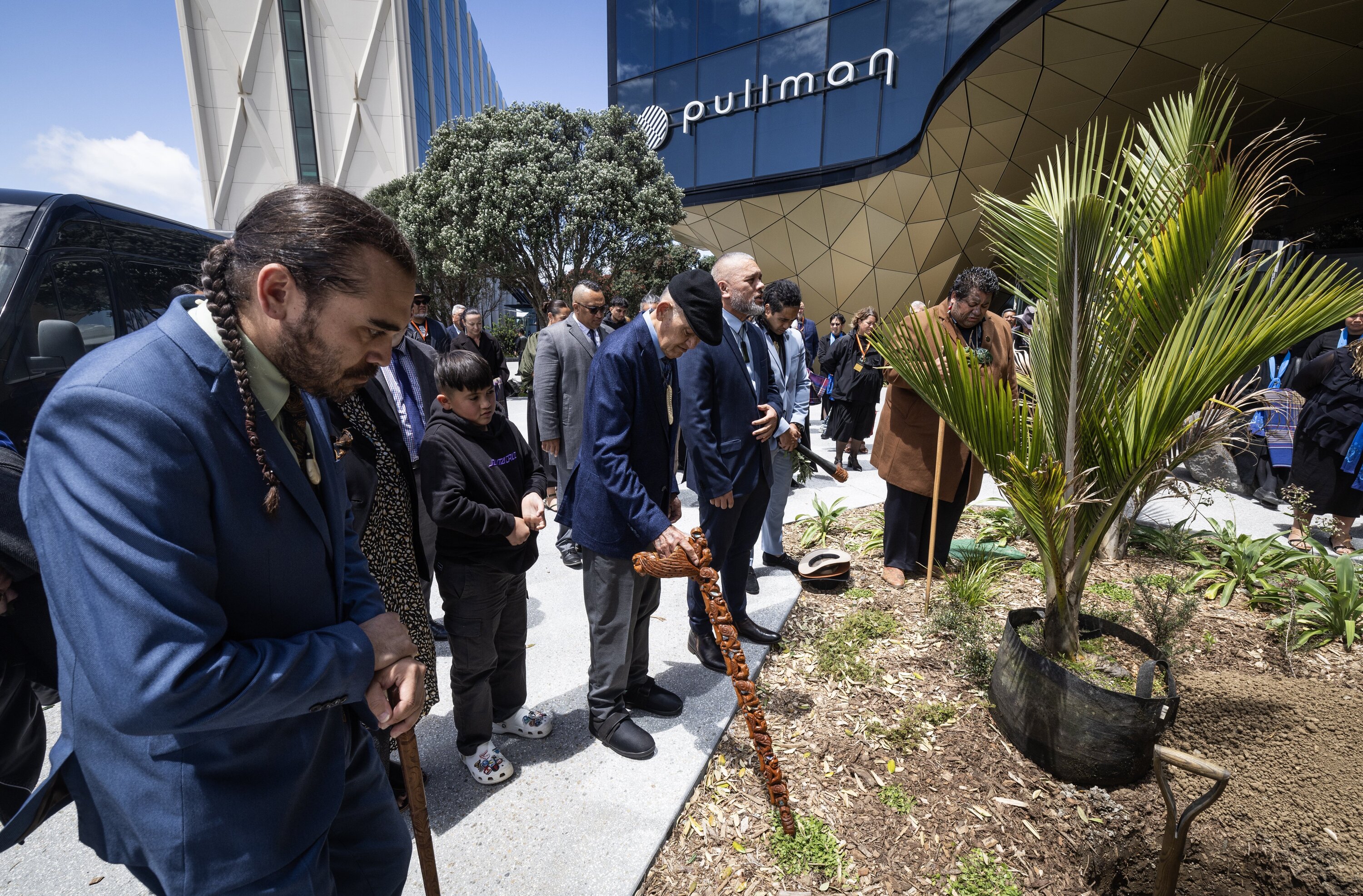 Kiingi Tuheitia Pootatau Te Wherowhero VII and mana whenua and leaders of Waikato-Tainui at a ceremonial tree planting for the opening of Te Arikinui Pullman Hotel. Photo / Jason Oxenham.