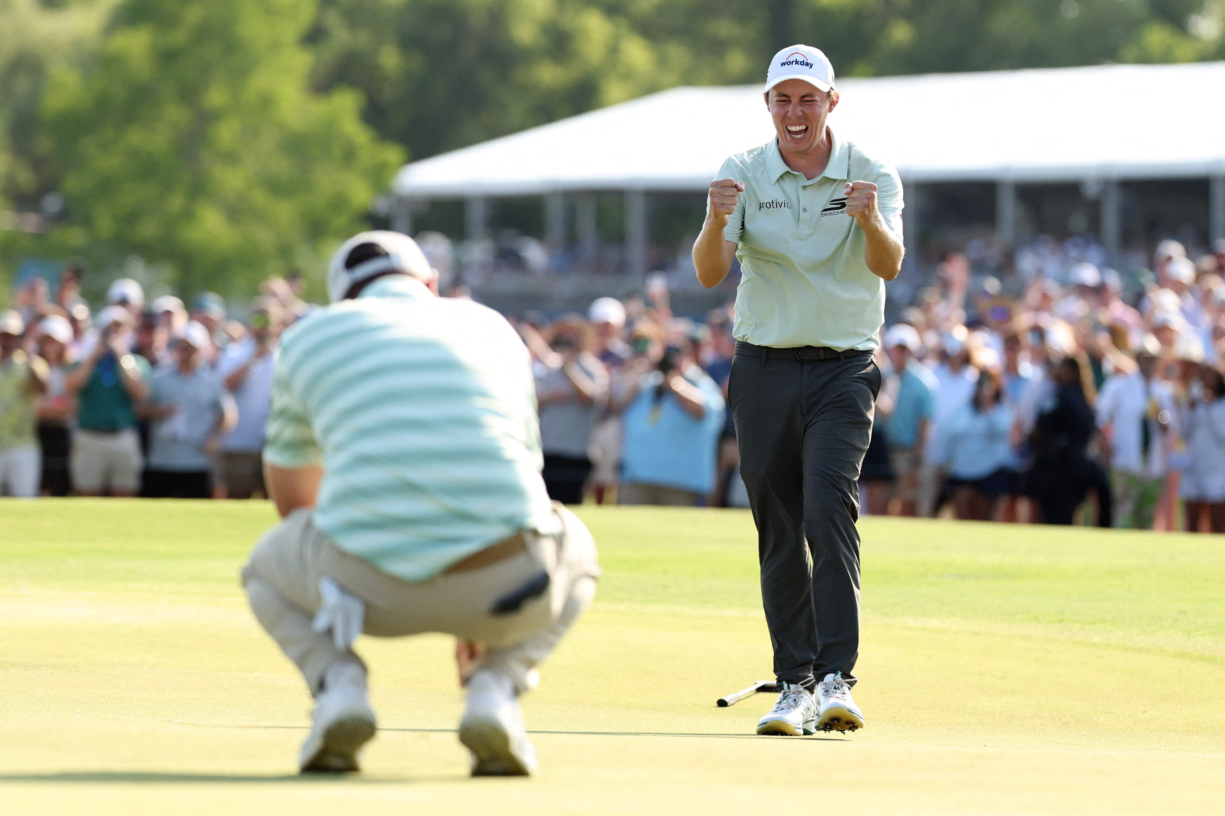Matt Fitzpatrick reacts after younger brother, Alex Fitzpatrick, putts them to victory in the Zurich Classic of New Orleans. Photo / AFP