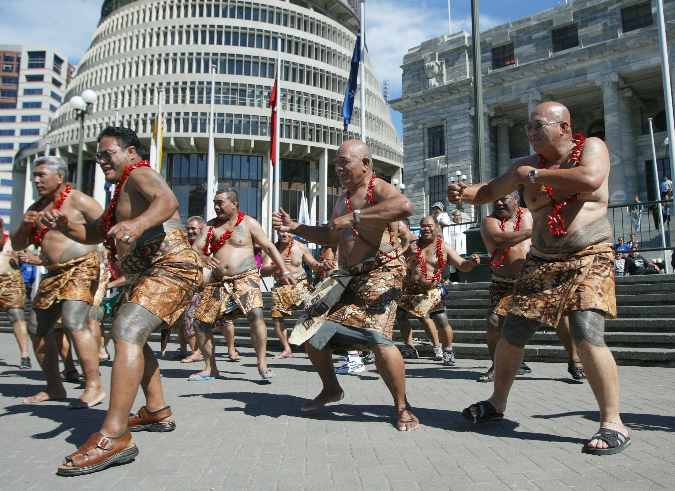 Members of the Samoan community perform the siva tau at a protest about seeking the repeal of 1982 citizenship act outside Parliament, in Wellington, in March, 2003. Photo / Mark Mitchell