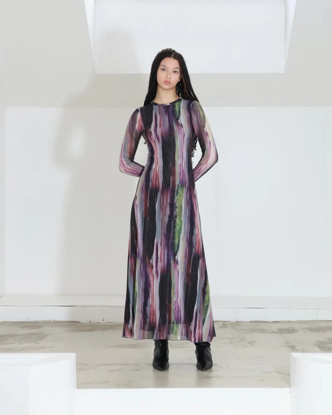 A new mesh dress by Jojo Ross captures rich jewel tones.