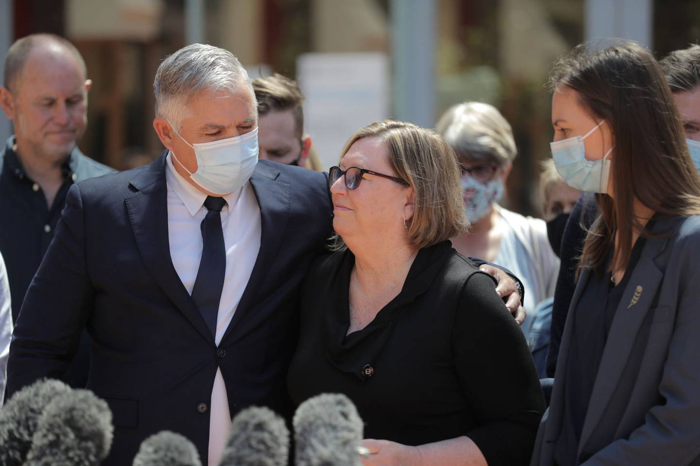 Diane Hunt, the mother of slain police officer Matthew Hunt, is supported by family friend and National MP Mark Mitchell outside the High Court at Auckland. File photo / Michael Craig