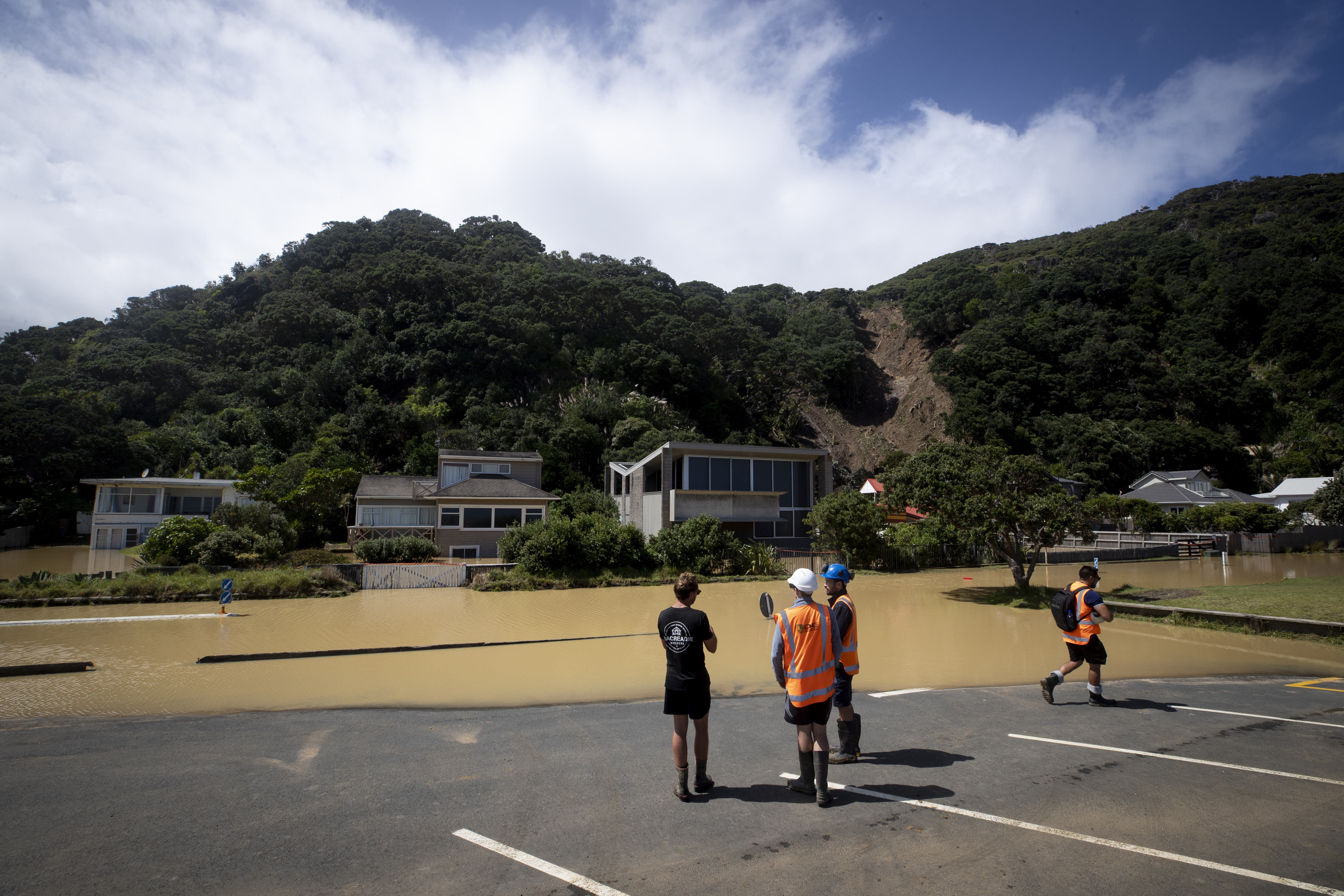 A number of properties along Marine Parade in Piha have been red-stickered after they were damaged by slips and flooding. Photo / Dean Purcell