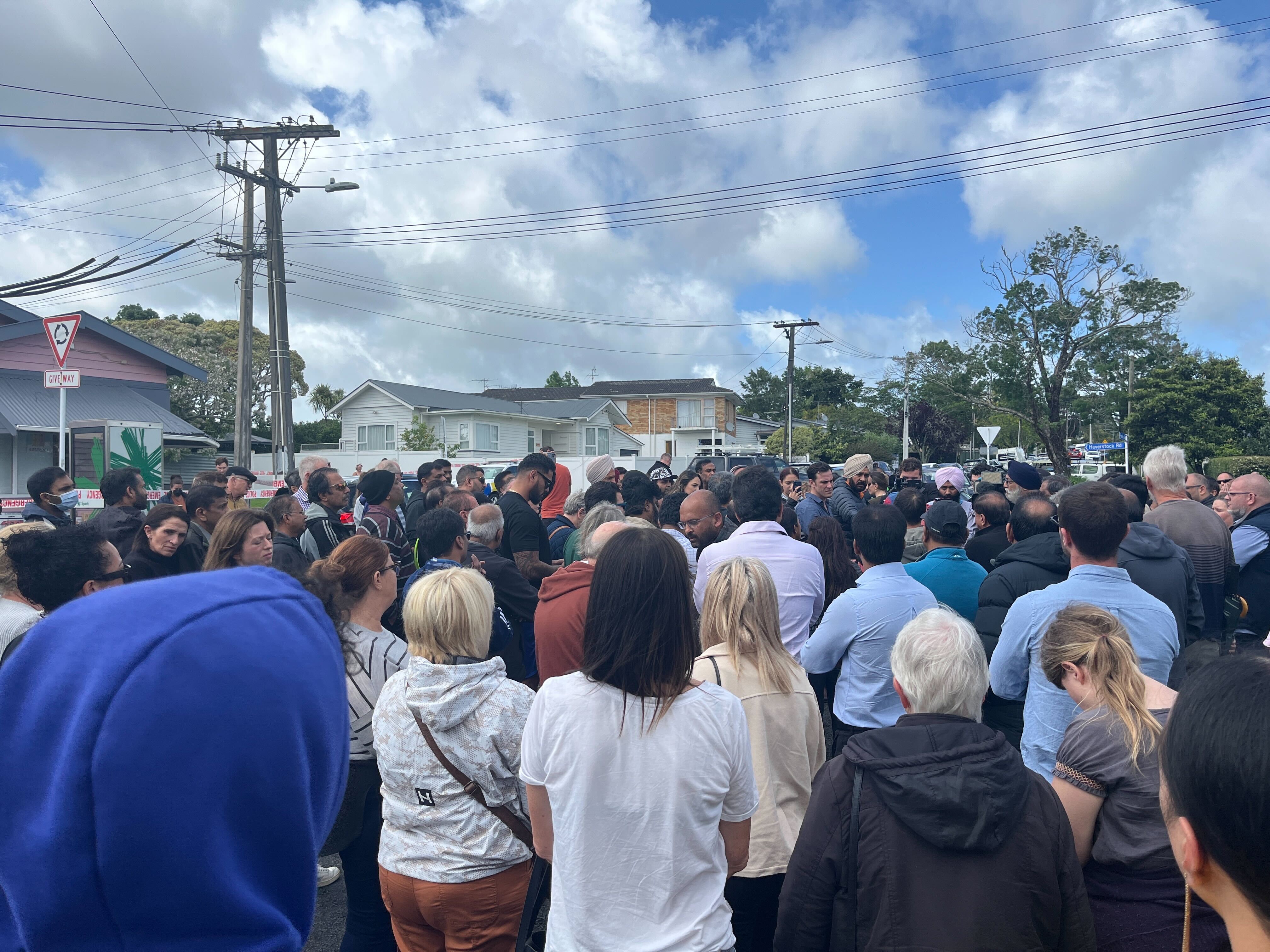 Two hundred people gathered outside the dairy. Photo / Benjamin Plummer.