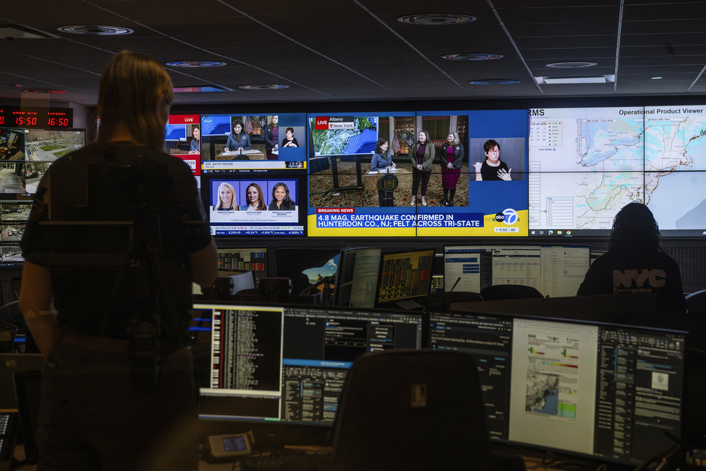 People monitor media reports in the command centre of the New York City Emergency Management Department last Friday in New York City. Photo / AP