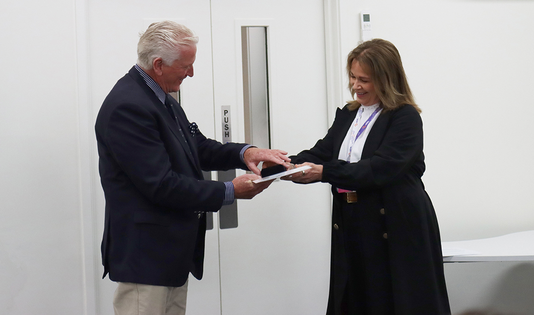 Shane McManaway receives his Honorary Associate award, presented by UCOL | Te Pūkenga Board Chair, Verne Atmore. Photo / Supplied