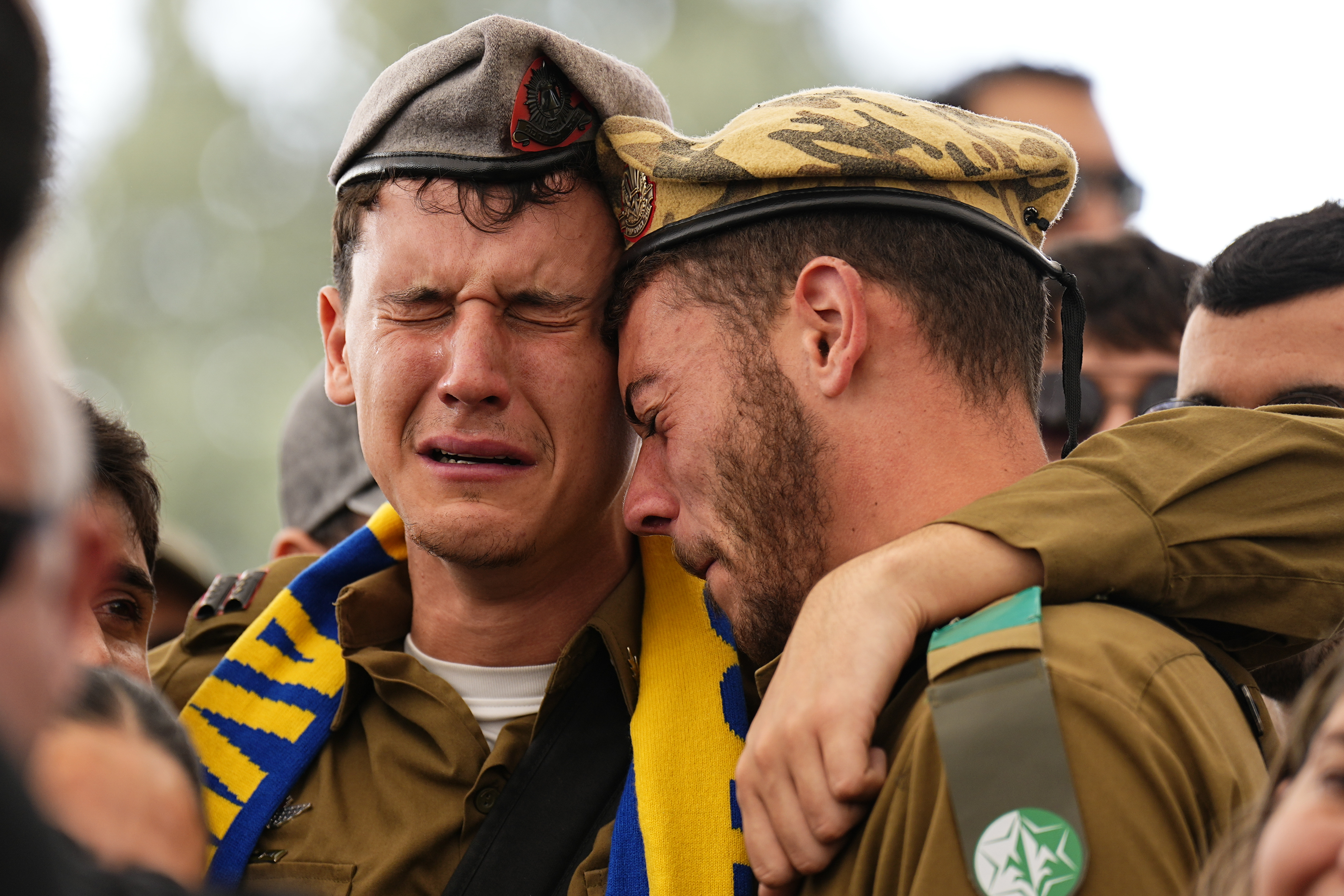 Soldiers and friends of Israeli soldier, Sergeant Dolev Malca, mourn in grief during his funeral in Shlomi, northern Israel, on the border with Lebanon, Sunday, March 3, 2024. Photo / AP