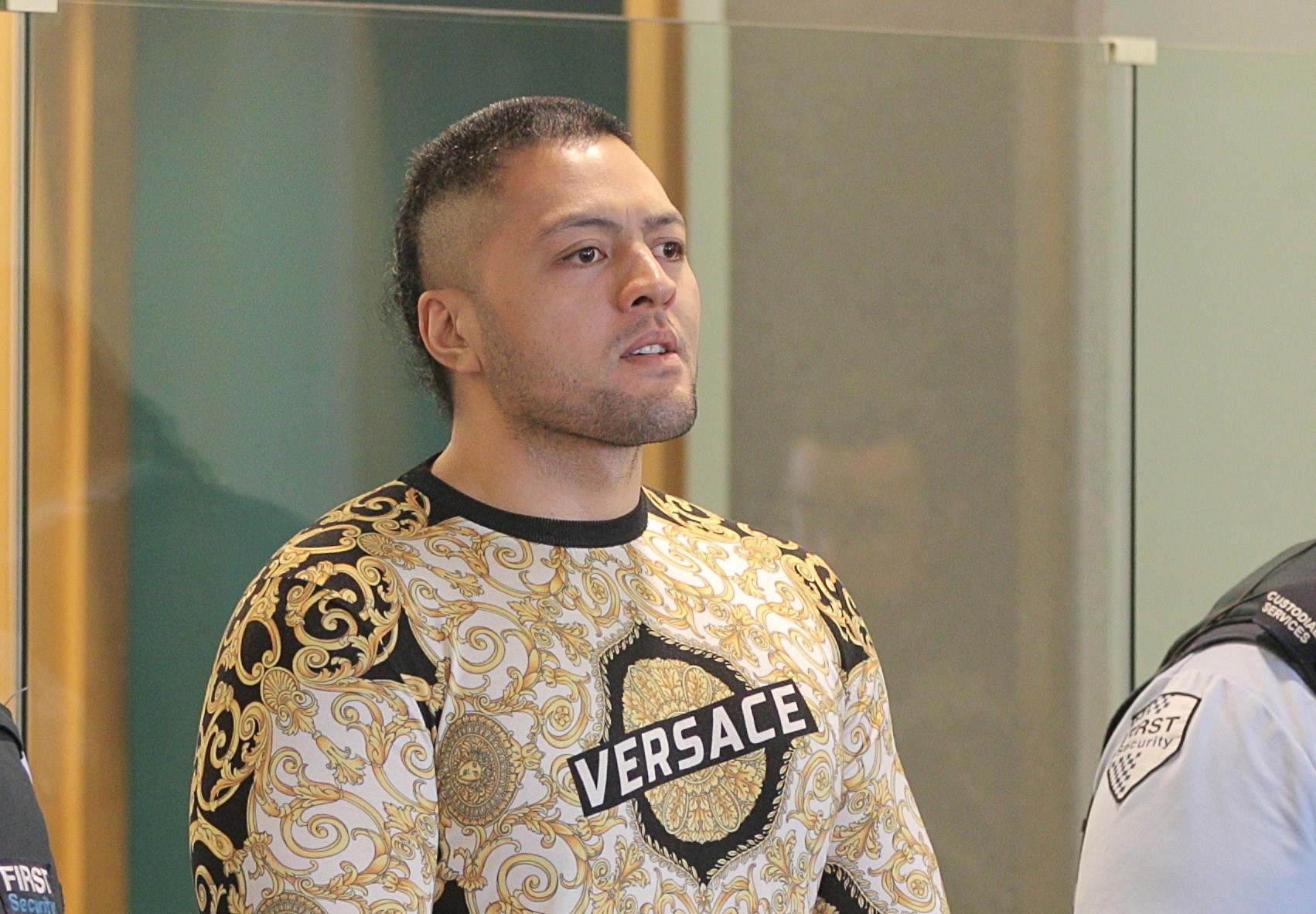 Comancheros vice president Tyson Daniels wearing Versace at his sentencing. Photo / Michael Craig