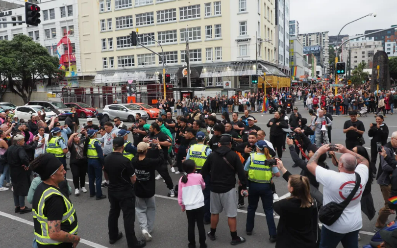 The Man Up protesters congregated at the intersection of Courtenay Place and Taranaki St in Wellington. Photo / RNZ