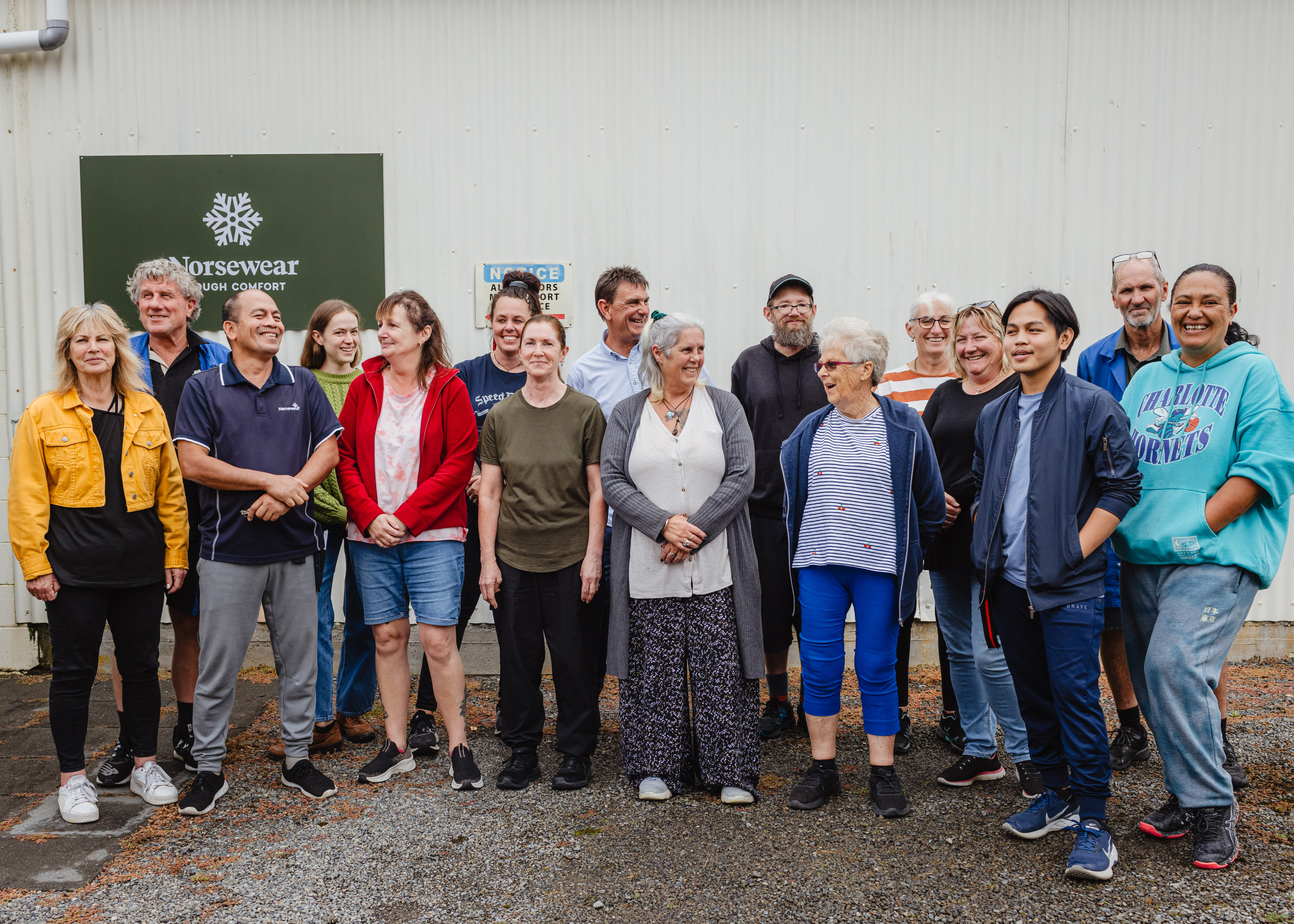 Norsewear's tight-knit staff stand outside the company's factory in Norsewood, 106km south of Napier. Photo / Supplied